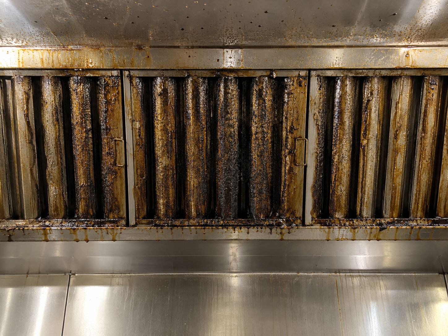 hood filters before (caked grease)